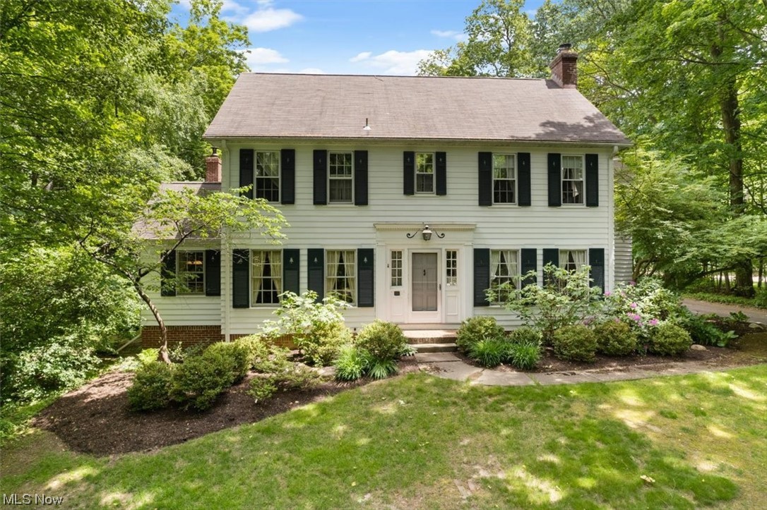 Welcome home to this charming 4 bedroom home. You will feel the love as you walk through the doors to a large living room with fireplace and a reading room surrounded by windows and a country kitchen with a wood burning fireplace for all those chilly nights. You will be excited to see the light and bright large sun room addition off the kitchen that overlooks the lovely gardens. There is plenty of room in the master bedroom with an attached sitting room and two more large bedrooms and plenty of storage on the second floor. The 3rd floor offers a full bathroom, bedroom, and a hang-out area/office. Entertain in the finished basement with a kitchen. This property is set back off the road with tons of privacy. Step outside to your own slice of heaven when you go on the patio that is surrounded by flowering perennials. A detached 3 car garage offers tons of room for cars and a workshop.