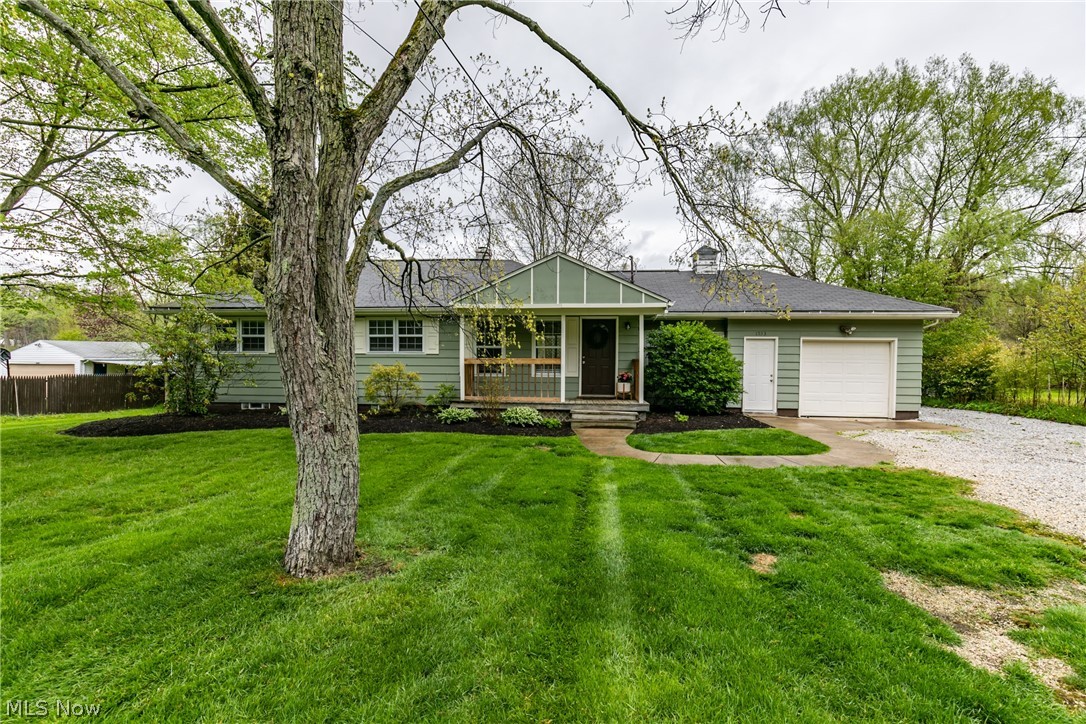 Welcome to this darling ranch located in Stow! Step on the front porch, where you could enjoy a cup of coffee and stare at your impressive front yard. The large living room is a great spot for entertaining, and has a sliding glass door to step outside on a nice sized deck. The deck will be the perfect place for all those summertime cookouts! The kitchen boasts beautiful cupboards that accent the backsplash, counter tops and stunning tile flooring. Three nicely sized bedrooms with a neutral paint color to make your own. Â A nice area in the basement that could be turned into a rec room. Do not miss the large fenced back yard!