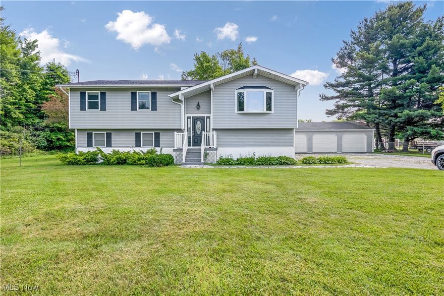 Escape to peace and privacy in this beautifully maintained bi-level home nested on a spacious 1.38-acre lot. This home offers the perfect balance of comfort, space and modern living in a country setting. Step inside to discover a welcoming open- concept area featuring an updated kitchen dressed in stainless appliances and a stainless basin sink. You'll find scenic views form the bay window in the upper-level living area with plenty of sunlight. Also, on the main level you will find a barndoor entrance to the bathroom with a whirlpool tub. The main bedroom offers a bathroom with a walk-in shower. The lower level of the home offers plenty of living space along with a laundry area. Attached is a two-car garage along with a detached 3 car space garage. Outside you will find plenty of space for gardening or recreation. New roof 2021, new furnace and AC 2025. Come see this beauty for yourself!