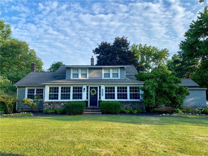 A rare find... a stunning century home on two beautiful acres in Concord Township. Featuring 4 bedrooms and 2 full baths, this home is full of character from top to bottom! The kitchen has an island with seating and appliances included. Family room is open to the spacious dining room, which has French doors that lead to the large front to rear living room. The living room features a beautiful fireplace and many windows for natural light. Enclosed large front porch is perfect for extra living space and playroom. The first-floor main bedroom has two large walk-in closets and a regular sized closet, giving amazing storage options! First floor bathroom recently updated, and mud/laundry room on main level for easy access. Upstairs you will find 3 large bedrooms, one with a walk-in closet, and one with walk-in attic access. Also on the second level, is ANOTHER storage room and additional full bathroom. Deck off of the kitchen leads to the park like private backyard. Apple and pear trees, ple
