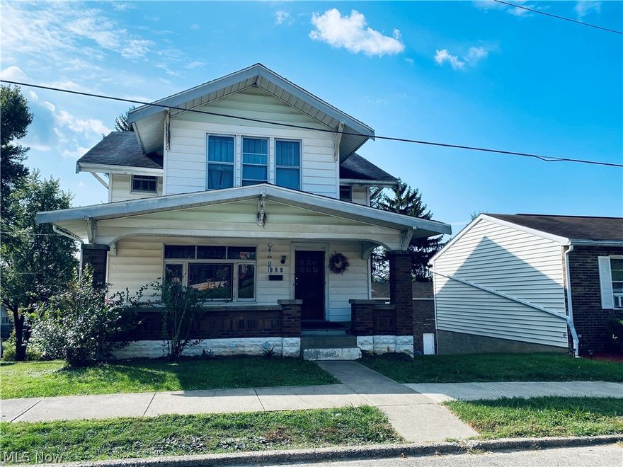 Charming older home with lots of character and charm.  Home can be a duplex or single family home.  Great investment or single family home, The home is currently set up as single family home. First floor master & bath, eat-in kitchen w/breakfast bar and built-in china hutch, Newer gas furnace, central air, & hot water tank, Freshly painted & new floor coverings, full basement w/laundry hookup & garage (Garage door is currently closed up). Large level backyard.  Close to city park and schools. Home is currently vacant and needs a little TLC.   Owner is Realtor