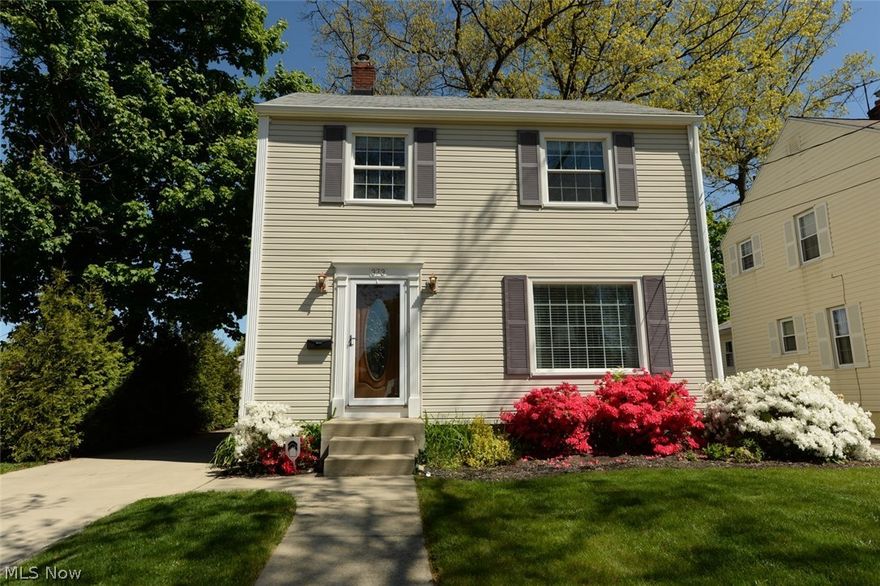 Pristine!!  Entirely updated colonial with stunning original hardwood floors and an amazing outdoor space.  New kitchen, new 1/2 bath and remodeled full bath.  Waterproofed basement with sump pump, separate utility area and finished rec room with tons of storage.  New vinyl siding, newly built 2.5 car garage, new driveway, sidewalk and front steps.  Sliding glass doors open up to a newly stained deck, brick patio area, large mostly enclosed back yard with a fire pit.  Newer double hung windows have custom blinds and window coverings.  New programmable thermostat and alarm system controllable by cell phone.  Must see!!
