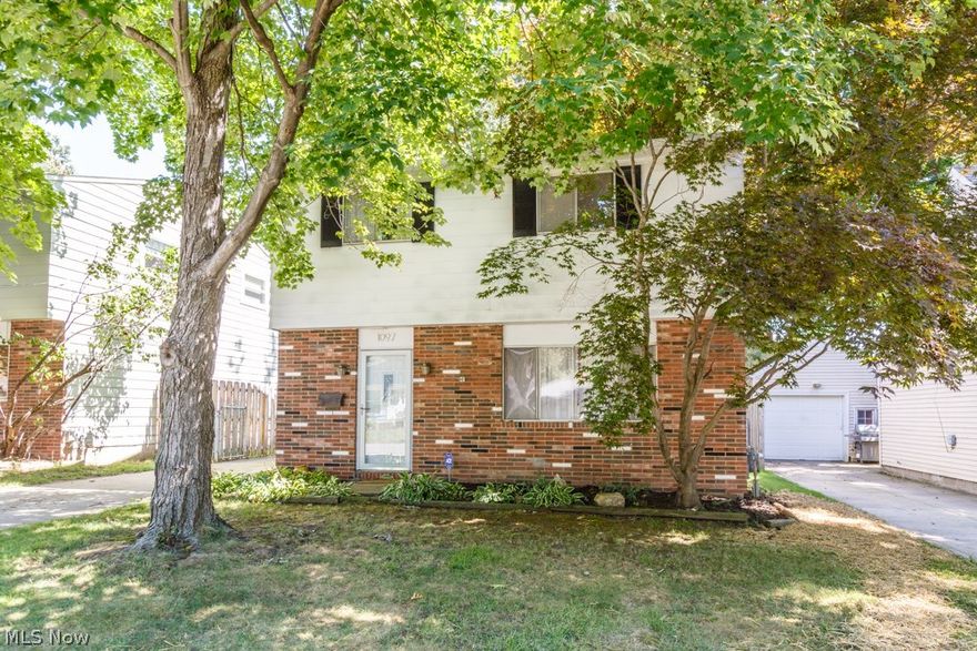 Tree lined street, Pella wood patio doors lead to fenced, treed backyard and deck. Beautifully remodeled. Kitchen was done summer 2004, Utility room was done April 2014, New furnace Oct. 2012, New hot water tank Dec. 2008, New roof (full tear off) Aug. 2007, New Electrical Box Aug. 2013