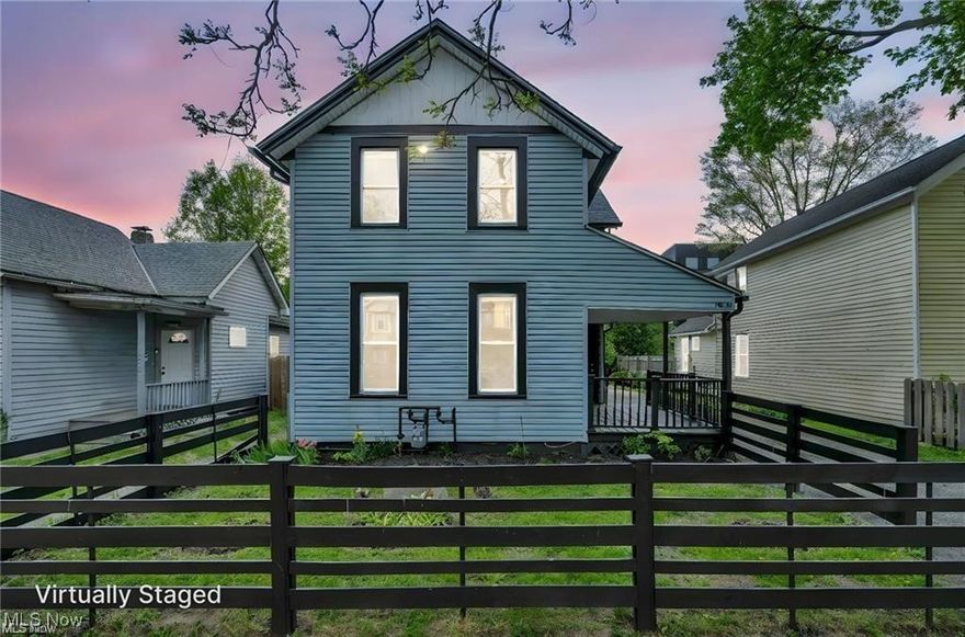 This beautifully renovated colonial in Tremont blends modern touches with unbeatable downtown views, visible from the backyard and the expansive primary suite. Step inside to find a spacious living room with luxury vinyl flooring that continues into a generous dining area—ideal for entertaining. Off the dining room, a massive first-floor bathroom impresses with dual sinks, a smart mirror, porcelain floors, and a tiled shower/tub combo. The updated kitchen includes granite countertops, a skylight, tiled backsplash, and access to the deck through sliding glass doors. A sizable first-floor bedroom offers ample closet space and flexibility for guests or a home office. Upstairs, you'll find three large bedrooms, including the show-stopping primary suite with a panoramic 60” window and en-suite bath featuring sleek porcelain finishes, a glass-enclosed shower, and smart tech. Recent upgrades include a high-efficiency furnace, A/C, hot water tank, and stylish lighting throughout.