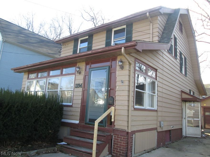 Large Akron colonial has 3 bedrooms and so much potential. Nice sized kitchen has lots of cabinets and counter space, hardwood floors, spacious living room too. Sliding door to back deck which overlooks the backyard is perfect for entertaining-just bring the BBQ! Some updates done and some repairs are still needed. Being sold as-is. Call today to schedule a tour!