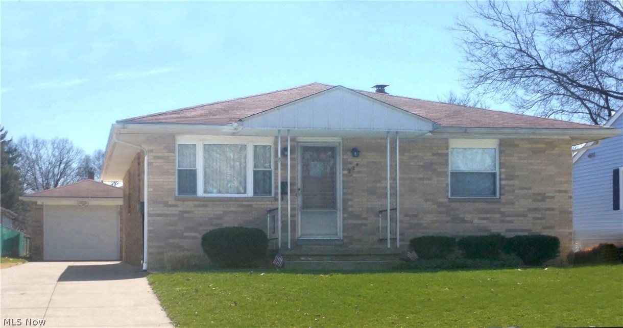 Remember the days of family gatherings when people brought their plates upstairs, downstairs, got together and played games, maybe a little ping pong or pool in the basement, had great fun and spent quality time with each other? This house is perfect for that! All-brick construction and well-built, this one-owner home has been loved and cared for by the same family for over 50 years. With three bedrooms and a bath up, a large recreation room and a basement bath down, there’s room for everyone. In fact it’s so accommodating, the owners served over 30 people at the holidays! The kitchen is nice, has lots of storage and comes with all of the appliances. The dining area is close by and was designed to hold a 6 ft. dining table! You’ll love the retro bath with its big mirror and base cabinet large enough to store about anything you’ll need. The home is solid, the floors are hardwood, the rooms are good-sized, the windows have been replaced for energy efficiency, and it’s a ranch so your ma