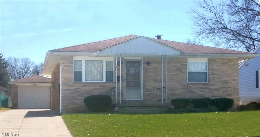 Remember the days of family gatherings when people brought their plates upstairs, downstairs, got together and played games, maybe a little ping pong or pool in the basement, had great fun and spent quality time with each other? This house is perfect for that! All-brick construction and well-built, this one-owner home has been loved and cared for by the same family for over 50 years. With three bedrooms and a bath up, a large recreation room and a basement bath down,  there’s room for everyone. In fact it’s so accommodating, the owners served over 30 people at the holidays! The kitchen is nice, has lots of storage and comes with all of the appliances. The dining area is close by and was designed to hold a 6 ft. dining table! You’ll love the retro bath with its big mirror and base cabinet large enough to store about anything you’ll need. The home is solid, the floors are hardwood, the rooms are good-sized, the windows have been replaced for energy efficiency, and it’s a ranch so your ma