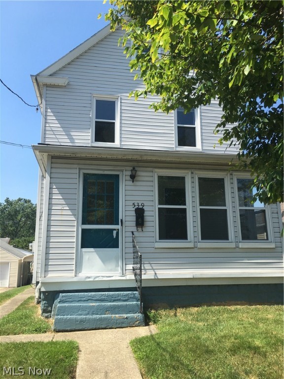 Cute two bedroom home with living room (recently painted), eat in kitchen (recently painted), and extra room which could be a dining room, office, bedroom, tv room, etc. located on first floor! Other amenities include lake view, enclosed front porch, car port. Second floor bedrooms are spacious. Upgrades include new boiler for heating located in basement, newer ac unit, new flooring in second bedroom, new tub surround in bathroom, main floor rooms freshly painted, newer handrail installed on back exterior steps. Home is currently an investment property. The package includes 6 SFR on Thelma Ave, SFR on Manchester Rd, an a duplex on Harrison. MLS numbers are 4165457, 416557, 4165570, 4165565, 4165420, 4166154, 4166147, 4166562, 4166165. Contact listing agent for more details.