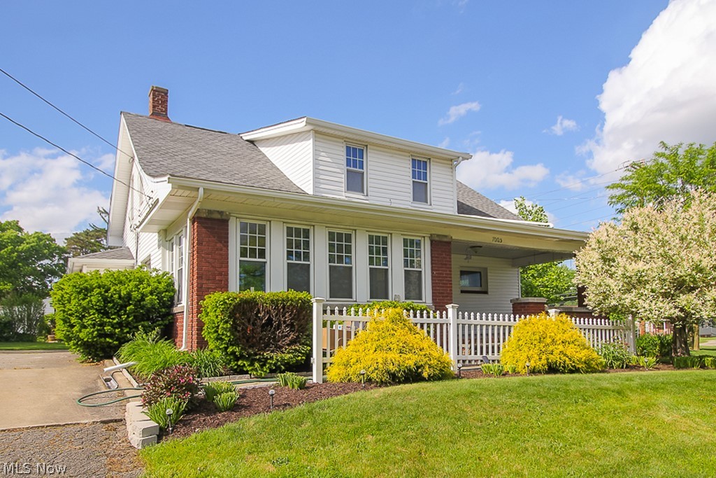 Beautifully maintained Colonial with historic charm! Walk right into the spacious living room with gas fireplace and lots of natural light! The large dining room features decorative built-in cabinets and even opens into an additional living area/sunroom. Both the living & dining rooms have original hardwood floors below current flooring. There is plenty of room to move in the kitchen, which offers newer stainless appliances that stay with the home! A convenient half bath can be found just off the kitchen and inside the back door. Upstairs is a spacious master bedroom with two closets, 2 additional bedrooms with plenty of storage space and a full bath with jacuzzi tub. The full basement has been recently waterproofed with a transferrable warranty. The 2.5 car garage has lots of storage space and a large asphalt pad for easy turnaround. The large front porch and expansive lot are perfect for relaxing and entertaining! Take advantage of the city of Independence's many amenities, including