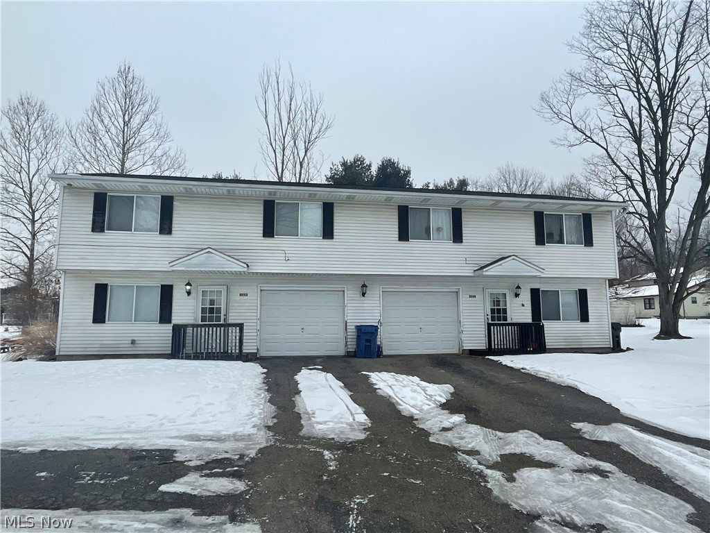 A fully occupied 2 unit turnkey investment. These large units have 2 bedrooms and 1.5 baths. There are living rooms, and family rooms in the lower levels. Each unit has its own attached garage. There is a large side yard. The units have been updated, and the roof and furnaces are around 5-6 years old.