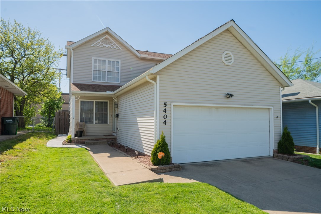 Want lots of room and flexibility in your new home? Say hello to this gorgeous Garfield Heights home.This one has it all: 3 bedrooms, 2.5 baths, attached 2-car garage - and that's just the beginning.The gorgeous laminate floors in the open-plan living and dining rooms were installed by Empire in 2019.Follow that through to the open kitchen, with plenty of working space, while remaining part of the party when entertaining.Or, enjoy your meals al fresco on the deck just off the kitchen; installed in May 2020, it's ready to enjoy good times.When it's time to sleep, climb the wooden stairs, also installed by Empire in 2019, to the 2nd floor where you'll find the spacious bedrooms, including an en-suite master.Downstairs, the finished basement provides plenty of flexibility - whether you're looking for a cozy spot to relax with loved ones or you need a home office nook, you'll enjoy living in this space.Running your household is even easier with the remaining dishwasher and microwave, along
