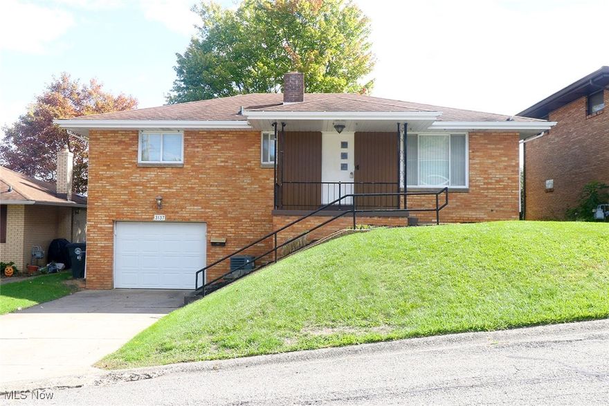 This charming three-bedroom, two-bathroom brick home has been beautifully updated and is ready for you to move
in. As you step inside, you'll be greeted by the warmth of original hardwood floors that flow seamlessly through the living
room, and bedrooms. The upstairs bathroom has been thoughtfully updated with a tiled shower surround and ceramic
flooring. The spacious basement features a large, finished rec room with a wet bar, perfect for entertaining, along with a
second full bathroom and new block windows. Other updates include a newer A/C, furnace, and hot water tank for added
peace of mind. Outside, you'll find a brand-new deck, ideal for relaxing or hosting guests. The range, refrigerator, washer, and dryer
are all included with the home. Close to essential amenities, public transportation, and schools