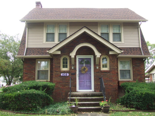 Well-kept, updated 3 bedroom, 1-1/2 bath brick colonial on corner lot. Carpet and wallpaper have been removed, natural woodwork and curved archways prevail! Large living room with fireplace, formal dining room, double door foyer, octagon-shaped sun room, breakfast room made into butler's pantry, 1st floor half bath and 2-car garage. Portion of backyard is fenced. Updates in last 7 years include roof, siding, windows, H2O, glass block windows, kitchen, baths; furnace=2003. Home Warranty included. Nothing to do but unpack and move in!