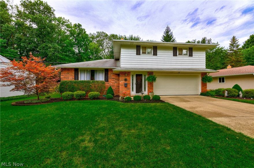 A beautiful Solon home with a stunning large back deck and rear yard!