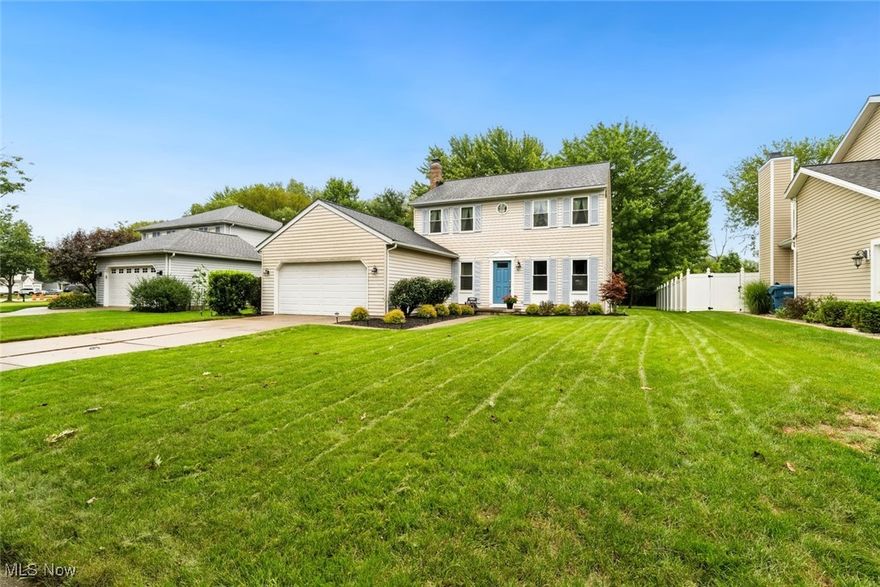 Beautifully maintained 4-bedroom Colonial in Plum Creek! This spacious home features an attached 2-car garage, 2 full baths, and a recently remodeled half bath. The kitchen has been completely renovated with high-end tile, countertops, and appliances. A cozy wood-burning fireplace highlights the living room, while the partially finished basement offers additional living space. Enjoy outdoor entertaining on the stamped concrete patio. Pride of ownership shows throughout. This move-in ready home is a must-see! Updates include: 2011 Roof, 2012 Windows, 2019 AC 2020 Furnace, basement wall repair, 2023 Chimney Work, 2024 Kitchen reno, main floor half bath, landscaping refresh