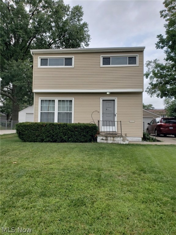 This house should be on your list! Nice open floor plan with all new carpet and fresh paint in 2018. Siding, windows, roof, sliding door from dining area to a deck for warm weather entertaining, and HW tank in 2013. Remodeled kitchen with newer cabinets, ceramic tile back splash, stainless steel appliances 2013, and new dishwasher 2018. Remodeled bath 2018, and a recreation room that adds another 238 square feet of living space! Back yard is completely fenced and the garage has an additional storage area with new service door. Conveniently located near shopping and schools, this home is a must see and is move- in ready.