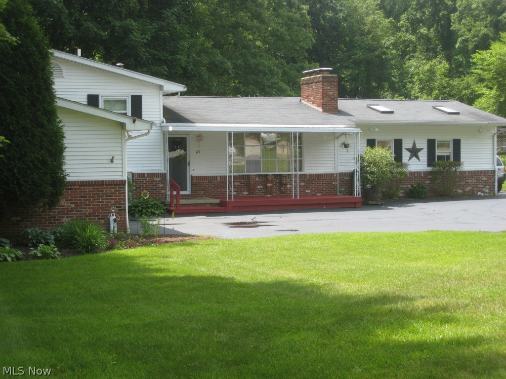 Want privacy and serenity yet close to everything? Here it is! Nestled in the trees, just steps away from the park trails, is this meticulously cared for 3Br 2 bath home. Amazing 25x22 bonus room, Perfect for the home office, play room, crafting, exercise room or theater room! Lots of built in storage throughout the house. Beautiful fireplaced living room opens to the dining room that walks out to the spacious deck overlooking the private backyard. The family room, office, laundry room and full bath complete the lower level. Unfinished partial basement with lot of built in shelving for extra storage. The applianced kitchen has plenty of counter space and and cabinets that include a double pantry. A spot to have your morning coffee, too! Close to Munroe Falls parks and trails., Riverview Elementary and Kimpton Middle Schools. Priced to sell! Call for your showing!