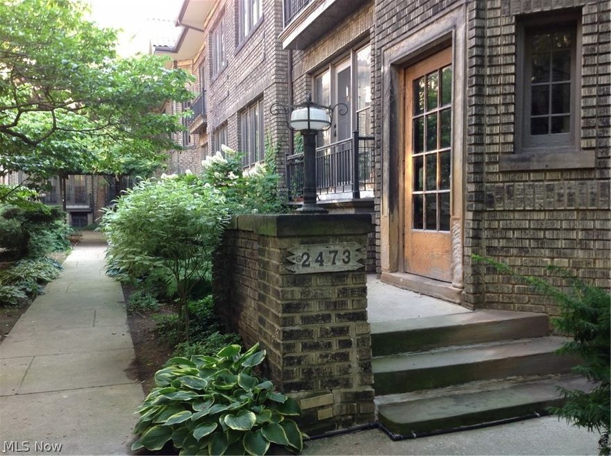 Welcome to 2473 Overlook * Top Floor Unit Offers Foyer entrance With Open Floor Plan * Contemporary  Meticulous Fresh * Living Room W/ Decorative Stone Fireplace * Dining Room *  2 BDRMS  & 1 Bath * New Kitchen with Granite Counter Tops Stainless Steel Appliances and State of the Art Washer Dryer Combination * Hardwood Floors Throughout Main Rooms * Ceramic Tile in Kitchen * Central Air Conditioning 2019 * Conveniently Located Within Minutes Walking Distance to University Hospital, Case Western Reserve, Severance Hall, Museums at University Circle, Cleveland Clinic, Coventry Village, Cedar Fairmount Area Restaurants and Shops, Little Italy, Rapid Transit Stop to Downtown and Hopkins Airport, and Much Much More.