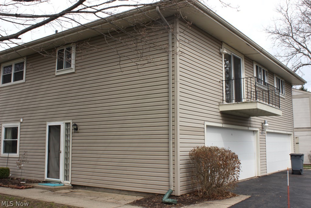 Wonderful 2 bedroom condo overlooking Prestwick Golf Course* One level end unit (on second floor)* Fully applianced kitchen- range, refrigerator, dishwasher, disposal & stack washer & dryer* New carpet except kitchen & bath* Balcony off of great room with view of golf course* Access to one car garage from inside condo* Extra storage in garage* Ceiling fans* Patio* HOA $182.95/mo. includes community inground pool, snow & trash removal, landscaping, exterior maintenance, assoc. insurance, property management* Freshly painted with neutral décor* Convenient location* Immediate possession upon close* Great opportunity to own*