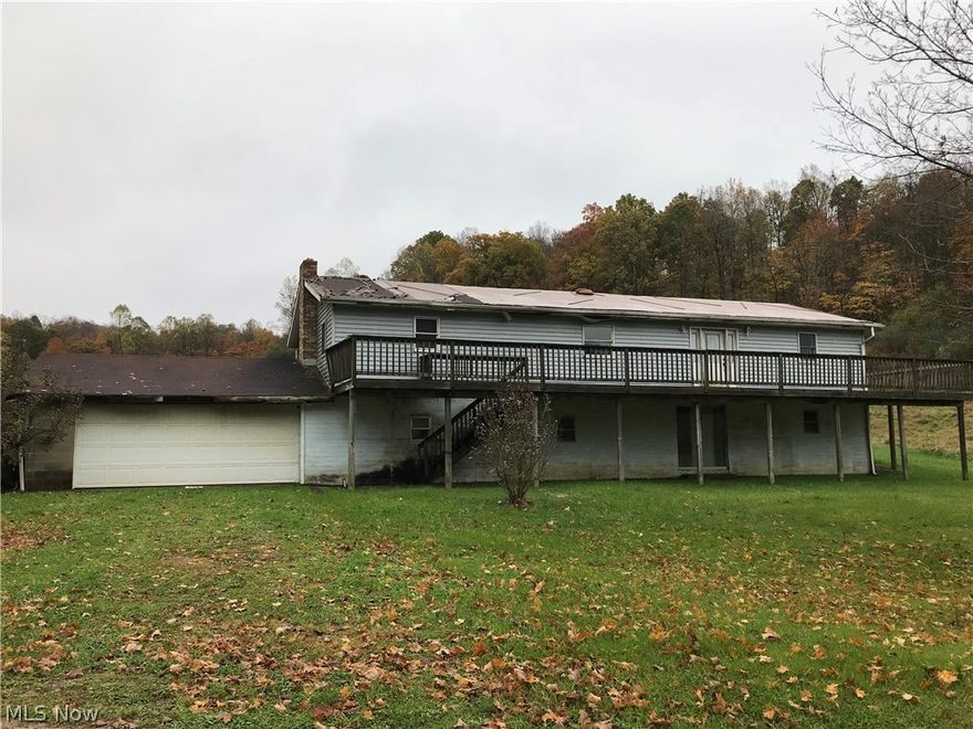 This is a manufactured home taxed as real estate on 3.3 acres. This home has 3 bedrooms, 2 baths and is on a full walk out basement with a 2 car attached garage. Interior access is not permitted due to the condition. Cash offers only will be considered. The seller will respond to all offers as of 5/14. This property sells as-is. It is the buyer's responsibility to verify all information and do their due diligence to check on any pending health and safety issues whether it be at a state or local level to include mold, lead based paint or any other health related issues. Employees and family members residing with employees of JPMorgan Chase Bank, N.A, its affiliates or subsidiaries are strictly prohibited from directly or indirectly purchasing any property owned by JPMorgan Chase Bank, N.A.