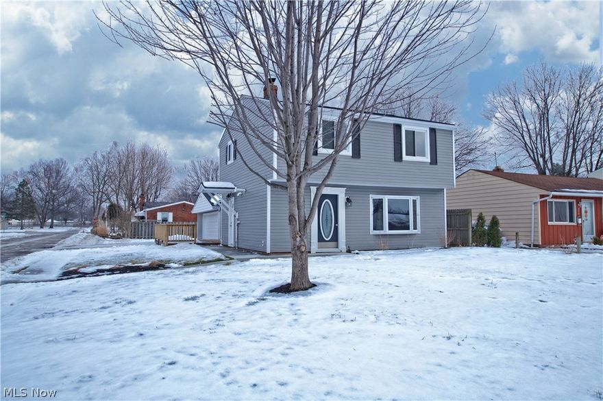 Welcome to this stunning, completely renovated with high end finishes, MOVE-IN READY 4-bedroom colonial with open floorplan located in the city of Eastlake.  This smartly designed home features over 1,900 sq. ft. of living space, an updated kitchen w/ modern (custom made) cabinets, all stainless-steel appliances, a built-in wine cooler, designer countertops and backsplash, laminate flooring, decorative lighting, 1 full/ 2 half baths, 2 and 1/2 car garage (heated, w/ hot & cold water hook-ups), a spacious family room w/ vaulted ceilings, skylight and a gas burning fireplace, living room, side entry/ mud room w/ custom built-in storage hub, new sliding glass doors leading out onto a wood deck and more.  The sellers have recently spent tens of thousands of dollars on exquisite upgrades to make this stylish and functional home what it is today.  Some of the updates include, but are not limited to: New roof, new siding w/ decorative shake over garage, new cement walkway, new garage door and