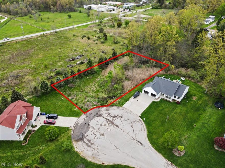 Rare LAND opportunity Rootstown Township! This .51 acre cul-de-sac lot offers a private setting with a tree-lined backdrop while still being surrounded by well-maintained homes in an established upscale subdivision. Enjoy the flexibility of no HOA along with a spacious homesite that provides room for your custom build, outdoor living space, and added privacy from neighboring properties. Under ground utilities with public water & public sewer connections at the street! Conveniently located with a mile of Rootstown Schools, in a close proximity to I-76, NEOMed, Restaurants and more, while still offering a tucked-away neighborhood feel. Bring your builder and start planning your next home in Rootstown!