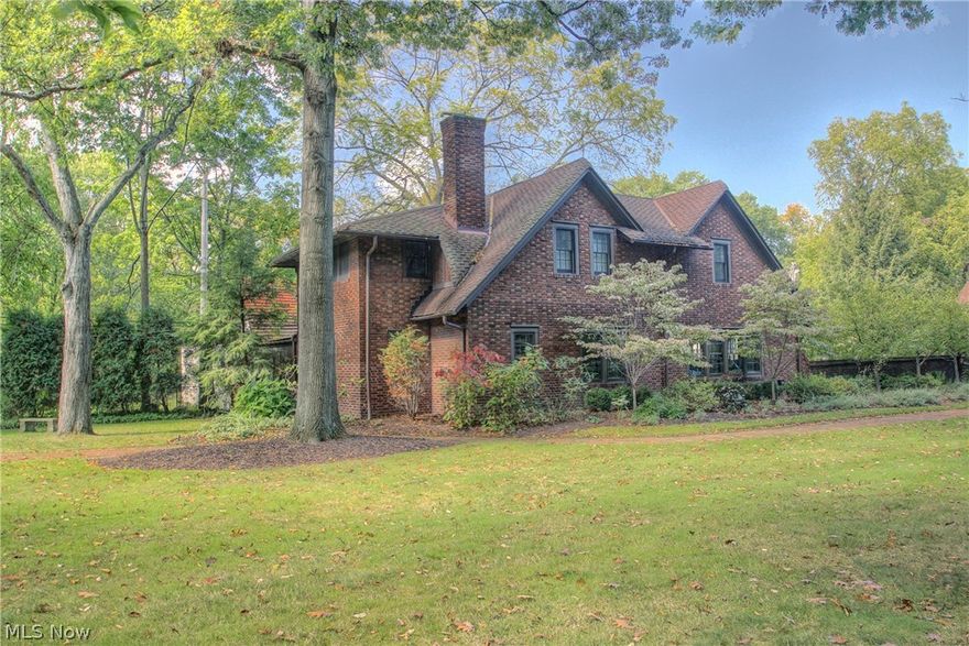 Tucked away on a private lush lot is this remodeled carriage house! Neutral paint colors, and a beautiful kitchen with granite counters and a breakfast bar! Ideal location in Shaker Heights! Award winning school system!