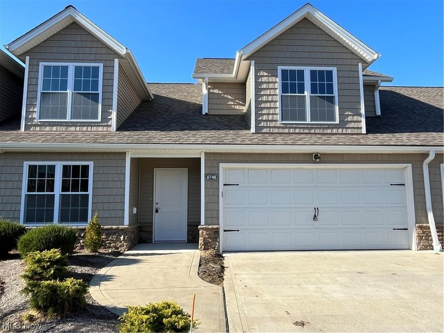 Beautiful Condo in Sandy Point!  Everything is new here, all fresh paint, new carpet in all bedrooms and Great room.  New vinyl flooring in kitchen, dining room, laundry room, baths and hall.  New Stainless steel kitchen appliances upgraded cabinetry and granite counter tops with a large pantry for storage. New furnace and A/C. Large first floor master with ensuite bath that has a walk-in shower. Two more large bedrooms with full large bath up-all bedrooms have walk-in closets. Loft area overlooking great room below. Two privacy fences on each end of concrete patio. Short drive or walk to beautiful Lake Erie!