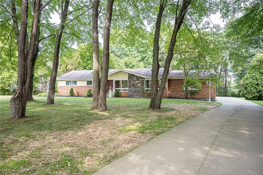 Welcome to this lovely 4 bedroom ranch with 4 bedrooms, 2.5 baths, 2,724 sq ft on 1.5 acres in Bath. Featuring an open floor plan with huge kitchen with granite counters, center island, stainless steel appliances, hard wood floors and plenty of storage space. Opens to dining room with hardwood floors and sliding door to large deck and private backyard. Spacious living room 2 large windows with views of the front yard. Master bedroom with master bath, dual sinks, jacuzzi tub, shower and walk in closet. 3 other bedrooms on main level and another full bath. Lower level features a 32x18 rec room and office. All new carpet and paint throughout the house and refinished hardwood floors. 2 Car garage. Simply a must see!!