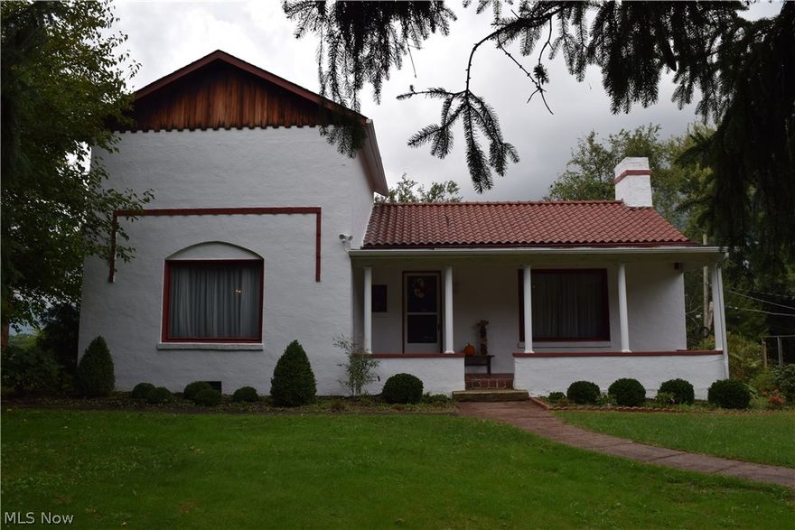 You will feel the pride taken in this home as soon as you walk in the door. Meticulous and spacious well lit rooms.  Located in an outstanding neighborhood with a private location feel.  This home is on a mature treed lot and has a welcoming large front porch with terra cotta tile flooring.  The living room has beautiful coffered beam ceiling and wood burning stone faced fireplace.  Large eat in kitchen has a tile backsplash and a great chalk board wall. Large open loft bedroom or office and 2 first floor bedrooms. Neutral paint throughout and newer furnace and air.  All appliances included.  $525 Home Warranty