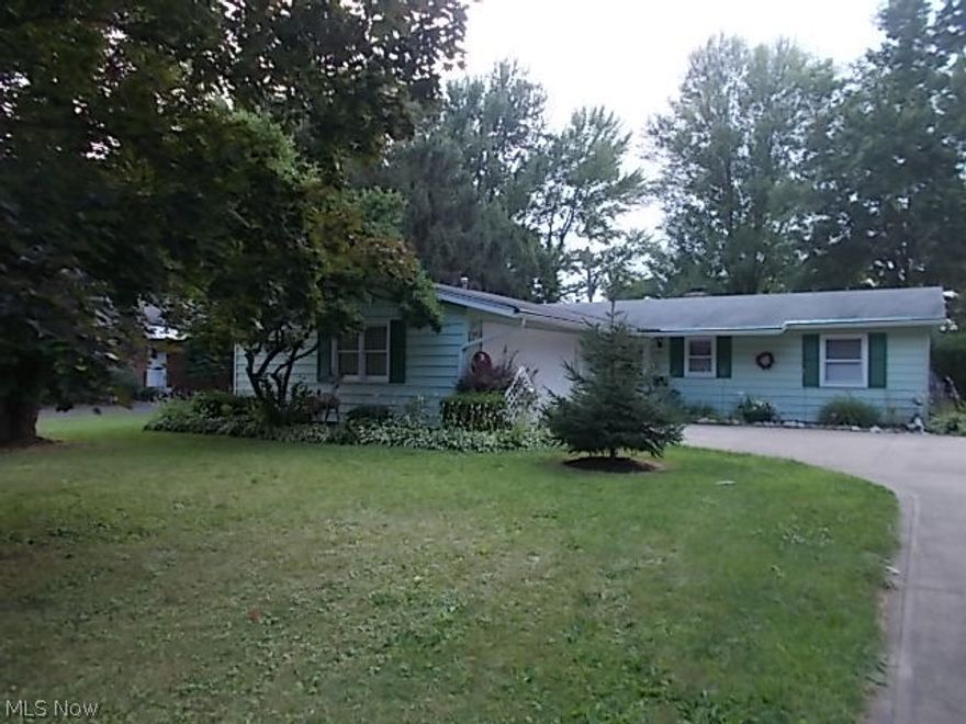 Nice 3 bedroom, 1.5 bath ranch home with covered back patio, attached 2 car garage & concrete drive.  Well kept with a nice large living room.