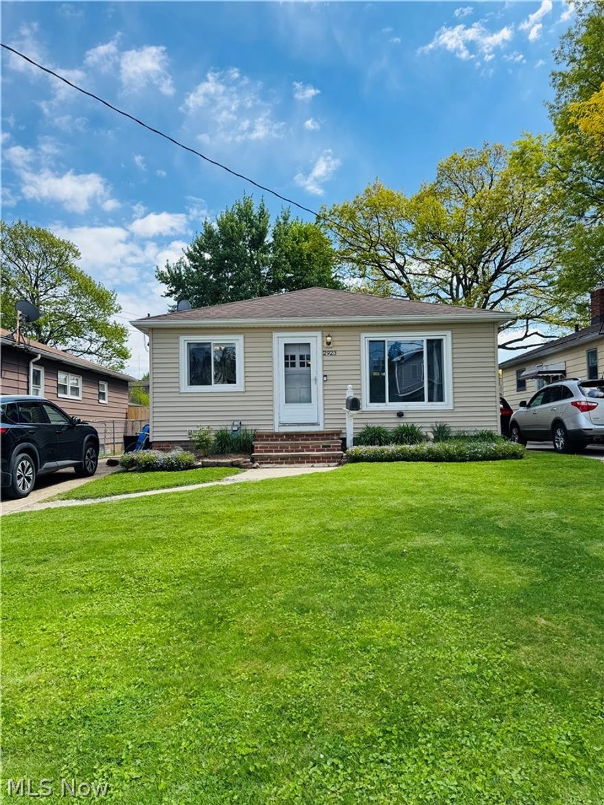 Charming updated ranch with tasteful improvements throughout. Offering comfortable single-floor living with bright living spaces, updated kitchen, bath, flooring, and mechanicals.  Nestled on a quite street this property offers a spacious backyard perfect for relaxing or entertaining. Conveniently located near parks, schools, and local amenities.  UPDATES INCLUDE: NEW FURNACE, A/C & HOT WATER TANK 2023, BATHROOM REMODEL 2022, NEW FLOORING AND CARPET 2020, NEW MICROWAVE, STOVE, AND REFRIGERATOR 2022, NEW GARAGE DOOR 2024.