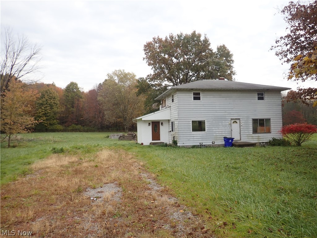 3-4 Bedroom, 2 Bathroom home on lovely 2.5 acres ready for the saavy investor or owner occupied sweat equity! Hard wood flooring! Previous owner opened up walls between kitchen and dining room for a more open concept! Oil heat with wood/coal burner option to heat too! Mostly newer windows! Well pump 2007. New Septic 2000. Roof approx 15 years old. Fantastic area of gorgeous homes! Close to Hartville Marketplace! So much potential here!!