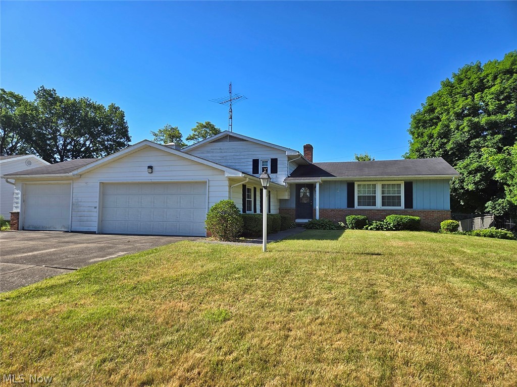 Welcome Home to this spacious split-level home built in 1966 with approx 1,852 sqft. The main level features an open-concept living room and dining room with vaulted ceilings and a kitchen with a breakfast bar. The upper level has three nice-sized bedrooms and a full bath. The lower-level walkout has a family room with a gas fireplace, a dining/game room with a wet bar, and a full bath and office. Lower level walks out to private in-ground pool. Partial basement with finished rec. room and laundry. Gas F/A furnace, central A/C, break electric, and lawn sprinkler system. Attached is a heated three-car garage. Public utilities. Parcel #28-496400. The home sits on a .3633 acre lot approx 86 x184. Convenient location close to shopping and restaurants. The home has lots of space and is ready for your updating and personal touch.