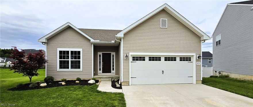 Welcome to 3434 Timber Trail, a beautifully maintained home nestled in the sought-after Forest Lakes subdivision in Uniontown, Ohio. Built just five years ago, this 3-bedroom, 2-bathroom residence offers 1,772 square feet of thoughtfully designed living space that blends modern comfort with everyday functionality. Step inside to discover freshly painted interiors and brand-new flooring and carpet throughout, giving the home a crisp, move-in-ready feel. The kitchen is a true standout, featuring elegant granite countertops, a new gas range, updated dishwasher, and stylish under-cabinet LED lighting that creates the perfect ambiance for cooking and entertaining. The living area is anchored by an updated gas fireplace, ideal for cozy evenings at home. Practical touches abound, including main floor laundry with both gas and electric dryer hookups, an extended two-car garage, and a generator-ready electrical setup for added peace of mind. The full basement is ready to be finished and already plumbed for a bathroom, offering tremendous potential for additional living space tailored to your needs. Situated on a quiet cul-de-sac, this home enjoys the best of community living. Forest Lakes features a playground, pavilion, scenic ponds, and walking trails right outside your door. Daily conveniences are minutes away, with Giant Eagle Market District and Green High School both nearby. East Liberty Park offers additional green space for outdoor recreation. This is a rare opportunity to own a nearly new home in a vibrant, welcoming neighborhood. Schedule your private showing today.