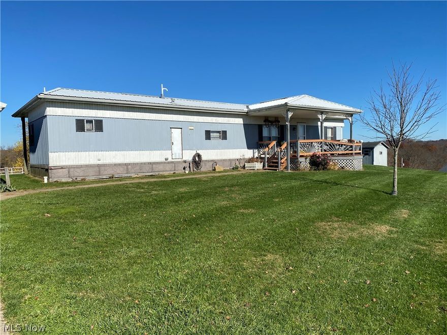 Located on the outskirts of Senecaville with fantastic views of the countryside is this 2 bedroom home with new carpet and freshly painted interior. There is a 10 X 16 foot storage building and a 12 X 20 foot storage building. Nice front and back porches.