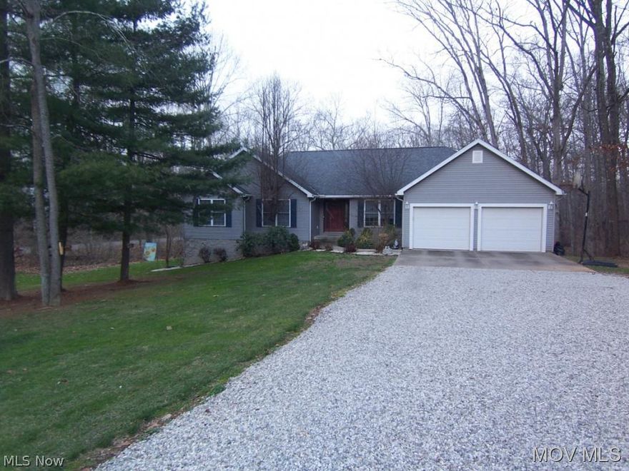 Recent improvements:  Shower in Master bath & floor, flooring in basement, new front door, some interior painting. New roof on north side of garage, new slider door in Rec Room.  Open area with kitchen/great room.  Basement is walkout featuring large rec room with bar/refrigerator area, full bath, 4th bedroom, office and unfinished area.  Beautiful wooded lot.  Garage is extended with 44 ft. offering parking for 3 cars.  All measurements are approximate.  Wall heater in basement is propane but not hooked up.  Elem: Little Hocking Elementary Scho  Elem/Bus: Y  JrHigh: Warren Middle  JrHigh/Bus: Y  High: Warren High School  High/Bus: Y  Fire: VOL  Police: SHF  PossFreeGas: N  ;SQFT=Fin L1:1836, Fin Bsmt:1341, Fin Above:1836, Fin Total:3173, Unfin Bsmt:495, Unfin Above:495;GAR= 3 Car Att, Opener(s)