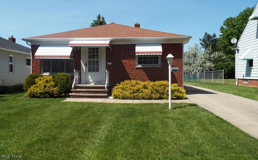 Wonderful 3 bedroom, 2 full bath ranch in convenient location near schools, shopping and churches.  Big ticket updates:  newer roof, windows, furnace, and air, large bedrooms, updated main bath; formal dining space, spacious finished recreation room in basement with wet bar plus entertaining space.  The basement also has a separate workshop and large laundry/utility area with counter space.  Eat-in kitchen includes all appliances.  Counter seating area opens to formal dining space.  There is also a large 2-car garage and a covered patio that overlooks the private backyard for your personal enjoyment.  The backyard also has room for a playset, pool, or garden.  Move right in and make this house your home today.