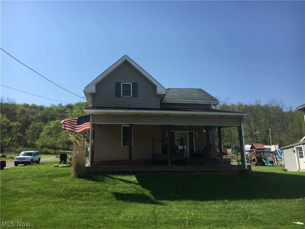 Vinyl sided 3 bedroom, 2 bath home in the village of Unionport. Home has main level bedroom, bathroom with laundry hook ups, living room, dining room & kitchen. Upstairs has 2 additional bedrooms, full bathroom & office. Detached 2 car garage with opener. Large covered front porch