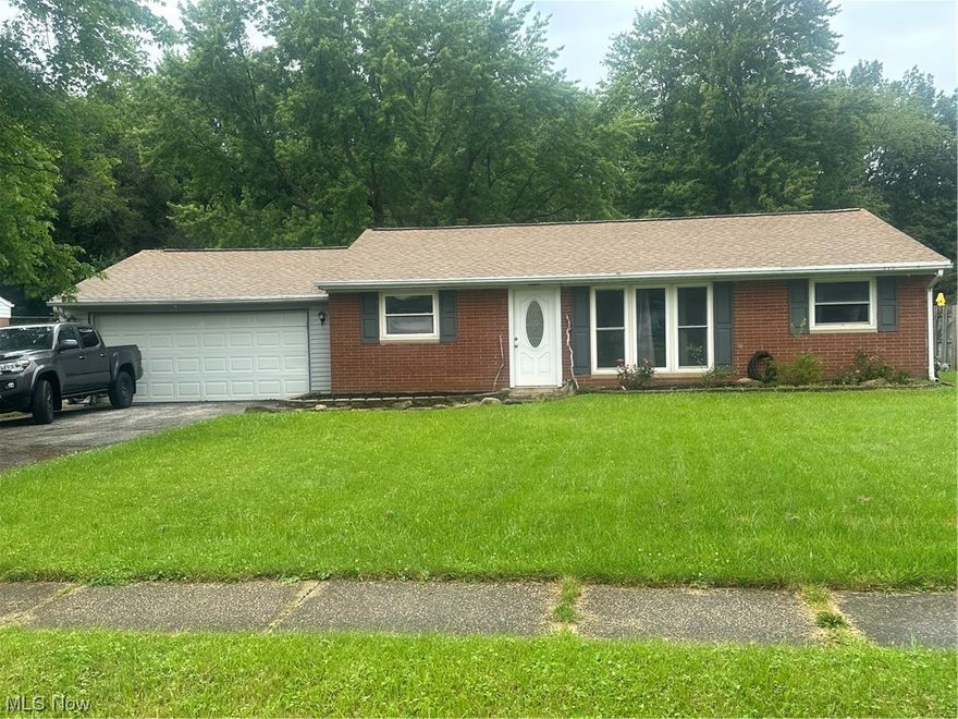 One floor living at it's finest in beautiful Madison.  This three bedroom one bath ranch is situated on a beautiful lot with a fenced back yard.  Over sized attached two car garage leads into the utility room with laundry.  Updated kitchen leads to open dining and family room with lots of space.  New Roof in 2020 and all the appliances stay!  Don't miss out on this gem in a quiet neighborhood!!