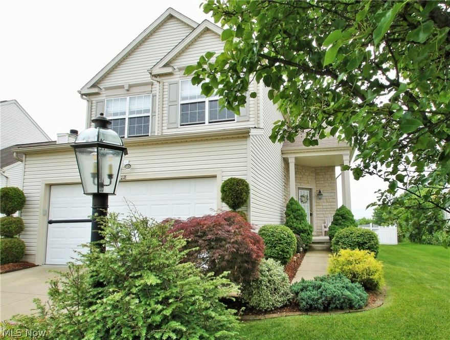 Incredibly well maintained home in the desirable Weatherstone Subdivision ~ a community with amenities that include a pool, clubhouse, playground & fitness center! Conveniently located just minutes from major highway access, restaurants & shopping. A covered front porch & front door with stone surround is your entrance into the foyer and a dramatic arch in the 2-story great room is an impressive feature in addition to a gas fireplace! An open eat-in kitchen offers a pantry, newly installed flooring, fixtures & back-splash and a Pella sliding glass door with built-in blinds. The first floor is completed with 1/2 bath & laundry room! The vaulted master bedroom includes a walk in closet & private bath. An additional guest bath & 2 spacious bedrooms can also be found on the 2nd story. The lower level has been completely finished offering a massive rec/entertaining area with a wet bar, workout area & plenty of storage closets! A brick patio in the backyard is surrounded by a meticulously ma