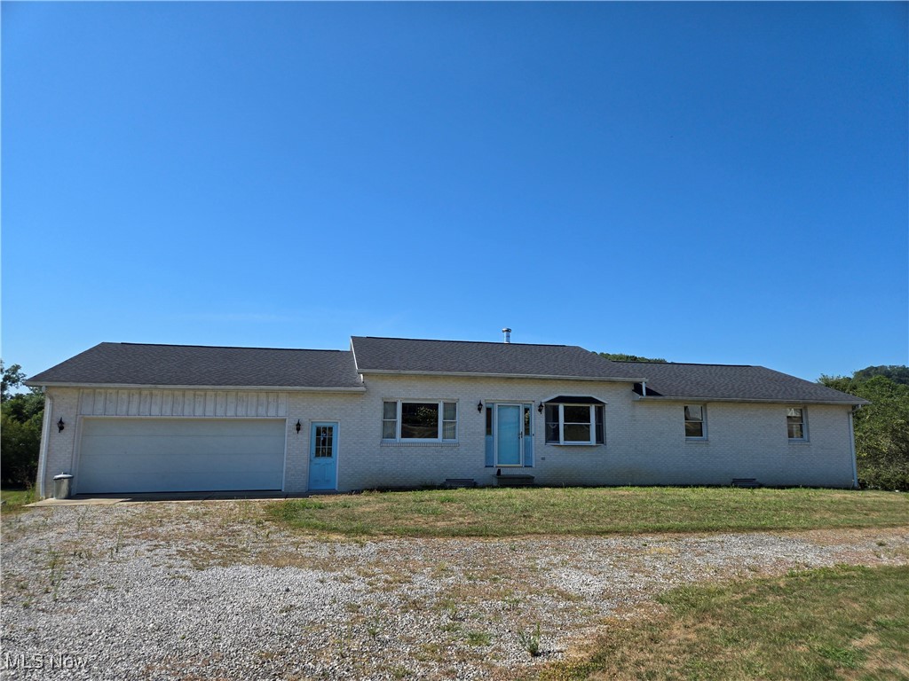 Great location, just minutes from downtown New Phila and I-77 and SR 250 highways, with all of the pleasures of country living. The 3-bedroom brick ranch was built in 1990 with a walk-out, unfinished basement. This is a one owner home/estate. The furnace is approximately 2 or 3 years old, roof is approximately 4 years old, no AC. A new aerator will be installed in the septic system. Older stove and refrigerator are not warranted. The main bathroom needs to be finished and only has a toilet. The first-floor laundry off the kitchen needs to be finished.
Come and see how you can make this home your own. Relax and enjoy the views.
The backyard has fruit trees - apple and pear.