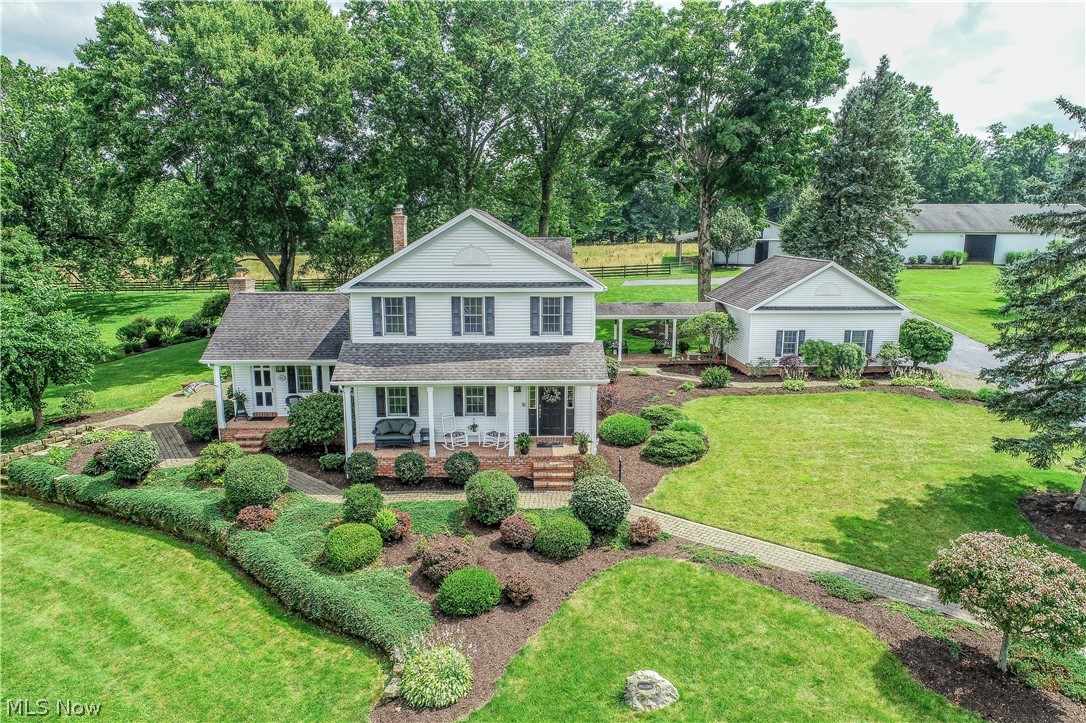 OUTSTANDING 26 ACRE HORSEFARM/ESTATE. Built in 2002, this Equestrian's Delight features an exquisite 3400 sq. ft., 10 room Colonial with 1st floor office, Laundry and magnificent sun room overlooking a huge patio and lake. Also includes 48 x 30 equipment barn, 50 x 40 two story garage with 14' overhead door for 45 'Motorhome, and kitchen with full bath and loft , ideal for caretaker or guest. Horses will love the 72 x 32 stable with 8 12 x 10 stalls, plus wash bay, and a fantastic 90 x 60 indoor riding arena. All this hidden away on a dead end road in South Range School District PLUS......FREE GAS!