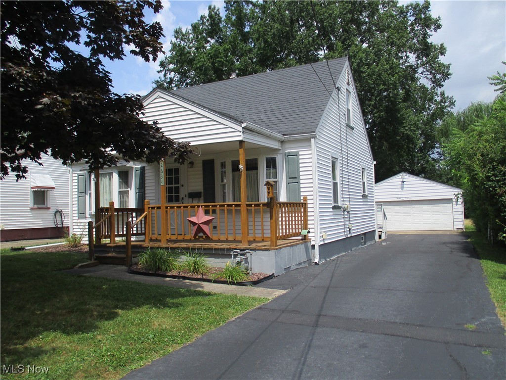 Deceiving - Larger than it looks! You can move right into this 3BR, 1 1/2BA Cape Cod. Close to the School, Library, and the new boulevards on Mahoning Ave. Vinyl-sided exterior. Detached, alum-sided double garage with added storage rooms. Blacktop driveway with concrete approach and floor in the garage. Roofed front porch. Roofed rear deck. Replacement windows and siding (2001). Roof (2018 - one layer). Garage roof (2018 - 2 layers). Sunporch with skylights. LR with bay window. Remodeled Kitchen (1995) with oak cabinets, vinyl flooring, laminate counters (2020), range is 1 yr. old (oven has never been used), refrigerator (2020). Cheery Dinette off the Kitchen with ceiling fan, vinyl flooring and access to rear yard and Sunporch. Front BR with bay window. Rear MBR with 1/2BA and laundry hookups. Sitting room/office/nursery, Freshly painted interior. Newer carpeting on the 1st floor. Window coverings included. Full Basement, glass block windows, furnace and A/C )2016), 40 gal., gas HWT, elect. breaker box, 100 amp service, shower in the basement, dryer stays. WON'T LAST LONG ON THE MARKET! CALL TODAY TO SCHEDULE YOUR VIEWING!
