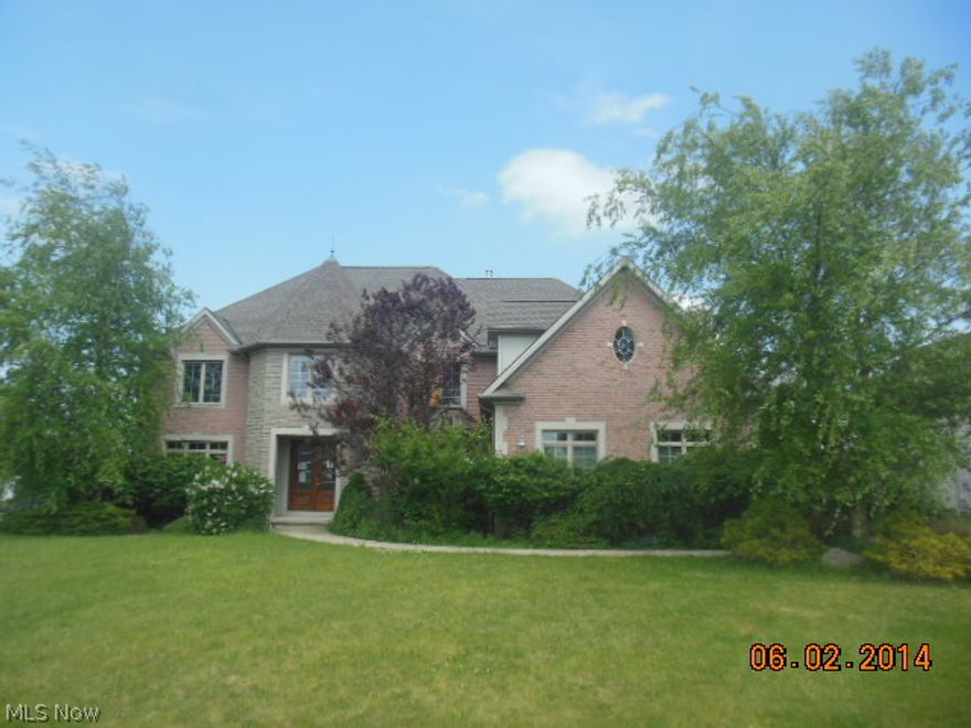 WOW! Vaulted ceilings, hardwood floors, ceramic floors, marble floors! Large eat-in kitchen with thick granite tops that gleam like the mountain side they were taken from!  Custom cabinets, perimeter cabinets, built-in stainless appliances with double oven and premium refrigerator! Island has built in shelves/storage - kitchen fireplace adds ambiance! Floor-ceiling fireplace in family room, double stairs, 9' front door entry, marble foyer. Finished lower level-executive style. Coffered ceiling the executive office. Master bedroom large enough for a king with a master closet the size of the 3 car garage  - but then again, it has that too!  Sprinkler system, landscaped backyard! Buyer responsible for own due diligence, inquiry and verification of all property information, condition, HOA, dues, sqft, tax and parcel data. Broker is not liable or responsible to verify any information as all data in MLS is reflective of public records. Buyers recommended to investigate all data.