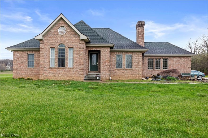 Welcome to the perfect blend of peaceful country living and convenience in Amherst. Situated on 16 beautiful acres, this one-owner ranch offers space, privacy, and endless potential.

A standout feature is the private, tree-lined driveway, once a railway bed, creating a truly memorable entrance. Positioned to face east, enjoy breathtaking sunrises & sunsets.

Inside, the home offers approximately 1,800 sq ft with a thoughtfully designed layout, high ceilings, and hardwood floors throughout. The inviting kitchen features custom made hickory cabinetry and views of the rear yard. Solid wood doors and trim add quality and character.

The spacious primary bedroom includes a cozy sunroom and his-and-hers closets. First-floor laundry adds convenience. The full basement with 8 ft. ceilings offers great potential for additional living space, with a sump pump and plumbing for a future bathroom already in place. Same square footage as floor plan above.

The property features a mix of open and wooded land, including approximately 6 acres of woods. Level acreage provides opportunities for gardening, recreation, or future improvements, while minimal landscaping offers a blank canvas to make it your own. A charming fish pond enhances the front yard.

The impressive 2,048 sq ft two-story (32 X 60ft)  pole barn, formerly home to Single Tree Winery, offers exceptional versatility with three half baths, a large upper level, patio, and ample space for storage, hobbies, or gatherings.

This rare property offers the perfect combination of land, functionality, and lifestyle, just minutes from town. All information provided deemed reliable but not guaranteed.  PRICED TO SELL!