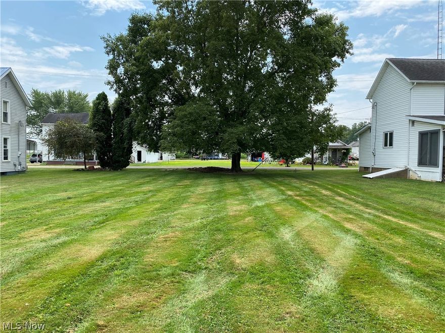This is a vacant lot in the city of Conesville. Land has a detached 2 car garage. Utilities are available. Great place to build a home, or to put your mobile home.