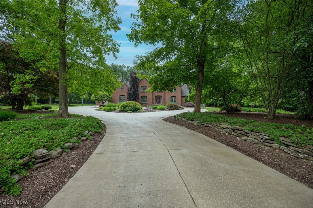 Elegant Brick Estate in a Private Cul-de-Sac Setting. Welcome to this exquisite two-story brick estate, gracefully tucked away at the end of a quiet cul-de-sac. Sitting on 2.15 beautifully landscaped acres, this 5-bedroom, 12-room home is a true masterpiece of craftsmanship, comfort, and timeless design.
With 4,790 square feet of luxurious living space, the home features 5 full baths and 1 half baths, two stately gas fireplaces, and an impressive heated three-car attached garage, plus an addt’l detached garage with a loft. The original attached 3 car garage was recently modified into a 2 car attached garage to accommodate a brand new walk-in first floor full bathroom. Inside, the grandeur begins with a marble-tiled entryway that opens into spacious,elegantly appointed rooms with custom-made plush carpeting w/ matching stained glass accents.
At the heart of the home is a chef’s dream kitchen, complete with a walk-in pantry and an enormous center island, ideal for entertaining. Step outside to a massive outdoor deck, perfect for al fresco dining or relaxing while enjoying views of the elaborate perennial gardens & professionally landscaped.
Additional features include:
* 2 furnaces & 2 central A/C units for year-round comfort
* 2 sump pumps & a brand-new off lot septic system
* 2nd fl laundry facility
* 2nd laundry facility in the basement that features a laundry chute coming from the Master Suite
* Special closet feature installed throughout the home. When each closet opens an automatic light that goes on.
* Several storage closets in the basement & throughout the entire home including an attic loft space in the detached garage
* The main foyer chandelier has a electric lift system so that brings down the chandelier for ease of cleaning
* The exterior of the home is hardwired with security cameras
Whether you're hosting grand gatherings or seeking a serene private retreat, this estate offers it all. It’s more than just a home—it’s a legacy!