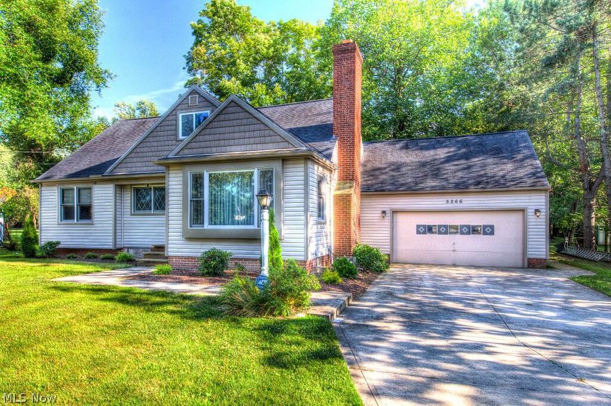 Spacious and Updated Cape Cod Situated on a Park Like Setting of Almost an Acre! ***Check Out the 360 Degree Panoramic Virtual Tour!*** Cozy Living Area with Fireplace Adorned with Decorative Mahogany Mantel! Formal Dining Room! Renovated Eat-In Kitchen with Newer Cabinetry! Versatile Bonus Room on First Floor Ideal for an Office or Sitting Room! Two Bedrooms and an Updated Full Bath Complete the First Floor! Upper Level Consists of Two Large Bedrooms and an Additional Full Bath! Tons of Storage! Large Lower Level Rec Room! Workshop in Basement! Enclosed Porch and Back Patio! Heated Attached Two + Car Garage! Concrete Driveway w/ Turn Around for Easy Accessibility. Storage Shed. Beautiful Treed Lot! Vinyl Sided including Beautiful Cedar Shake Style Accents.  Newer Windows and Roof! Updated Electrical! High Efficiency Furnace + Central Air! Home Warranty Included! Walking Distance to Shops! Call to Schedule a Private Showing Today!