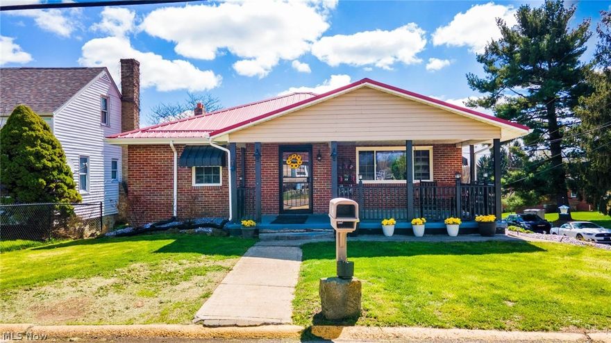 OPEN HOUSE 4.18.26 10AM-12P.   Tucked on a corner lot, this inviting ranch-style home brings together comfort, character, and a touch of the outdoors. With four bedrooms all on the main level, it offers easy, one-floor living wrapped in a warm, cabin-like atmosphere. Step inside to find rich elm-lined walls that give much of the home a natural, woodsy charm. The open kitchen and dining area feature seamless concrete countertops and a layout that feels both functional and welcoming—perfect for gathering over a home-cooked meal. The space flows easily into the great room, creating a relaxed setting for everyday living or quiet evenings in.  French doors open onto a spacious covered deck, where you can unwind and take in views of the large, fenced backyard—ideal for pets, play, or simply enjoying the fresh air.  The main level includes a comfortable primary bedroom and an updated full bath with ceramic flooring. A two-car garage, durable metal roof, and the added privacy of a corner lot round out the property. If you’re looking for a place with a little rustic soul and plenty of practical space, this home is ready to welcome you in.  Less than about 5 minutes from PA state line, RT 22, and elementary school.   SELLER WILL NOT LOOK AT ANY SALE CONTINGENCY AT THE TIME OF LISTING, PRE APPROVED BUYERS TO MAKE APPTS PER SELLER KIND REQUESTS, SELLER WILL ONLY LOOK AT OFFERS WITH A MINIMUM OF 1% EARNEST MONEY.  AMENITY LIST PROVIDED WITH MORE UPDATES AND PERSONAL PROPERTY DISTRIBUTION.